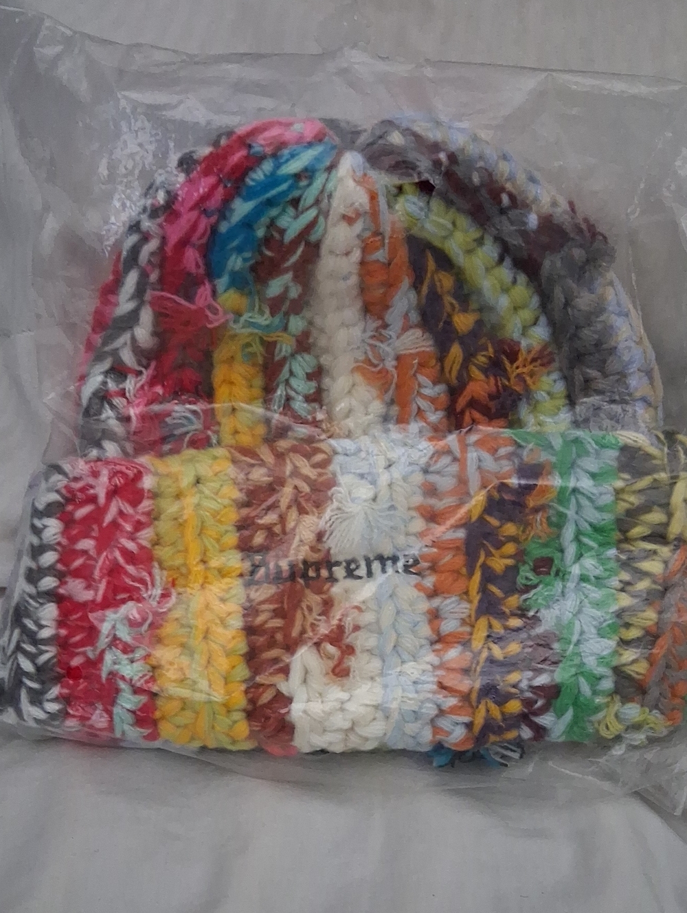 Multicolor Hand-Knit Striped Beanie with Embroidered Logo